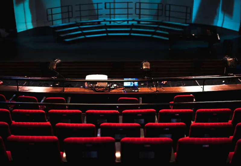 Interior view of Kamani Auditorium, a premier cultural venue in Delhi.