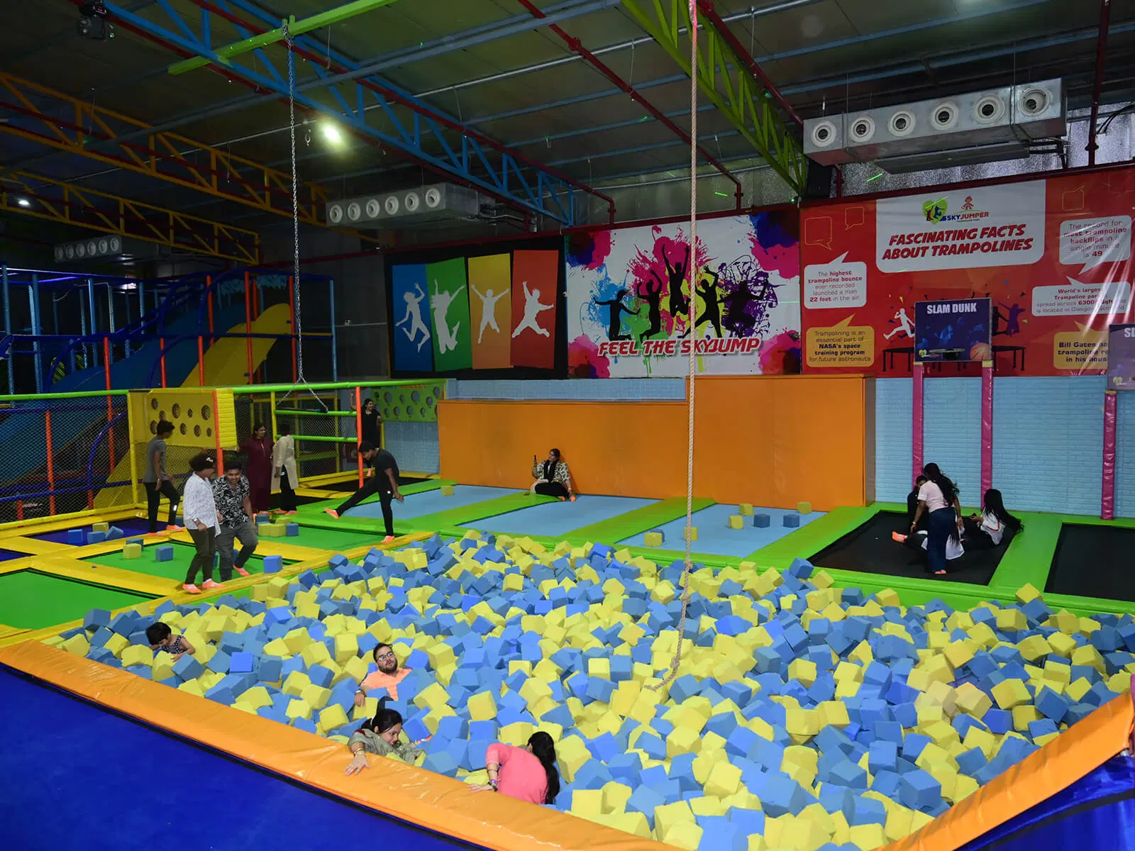 Kids and adults enjoying at SkyJumper Trampoline Park in Delhi – indoor fun and adventure destination.